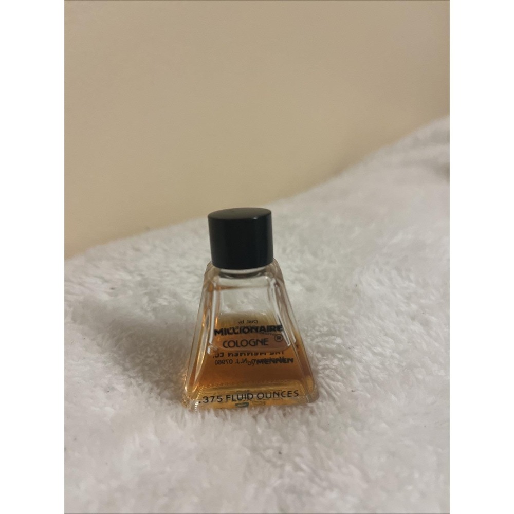 Vintage‎ 1970's Millionaire Mennen Cologne Mini .375 oz.  ~ Half Full